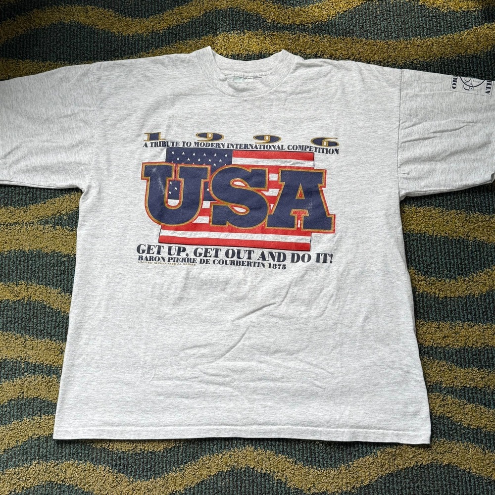 Vintage 90s Baron de Coubertin Olympics 1996 USA T-Shirt OSFA (XL Fit)‎